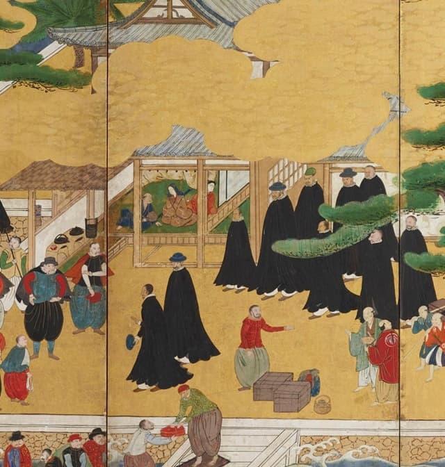 『南蛮屏風』の一部。日本の港町に南蛮人が到着する様が描かれている。(出典:ColBase)