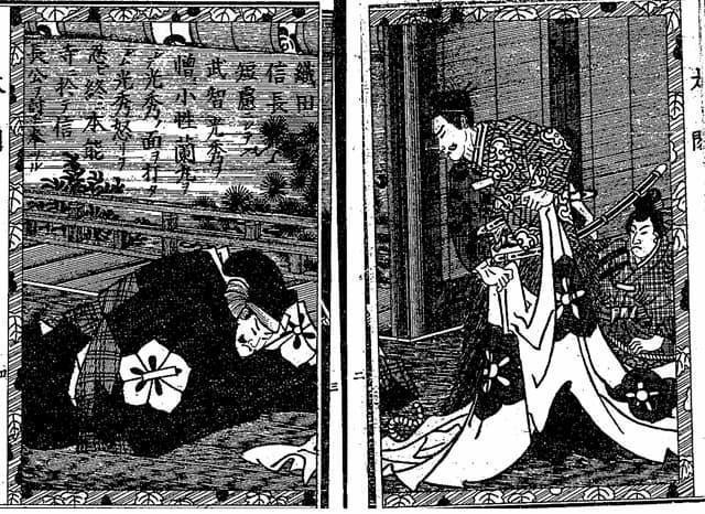 信長に叱責される光秀(『絵本太閤記』より。出典:国立国会図書館デジタルコレクション)