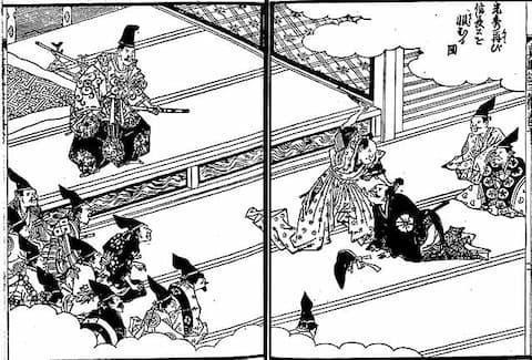 『絵本太閤記』信長の怒りに触れて饗応役を解任。食い下がって森蘭丸に殴られるシーン（wikipediaより）